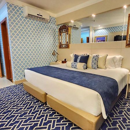 Golden Lis Hotel Boutique Goiânia Kültér fotó A bedroom at the hotel