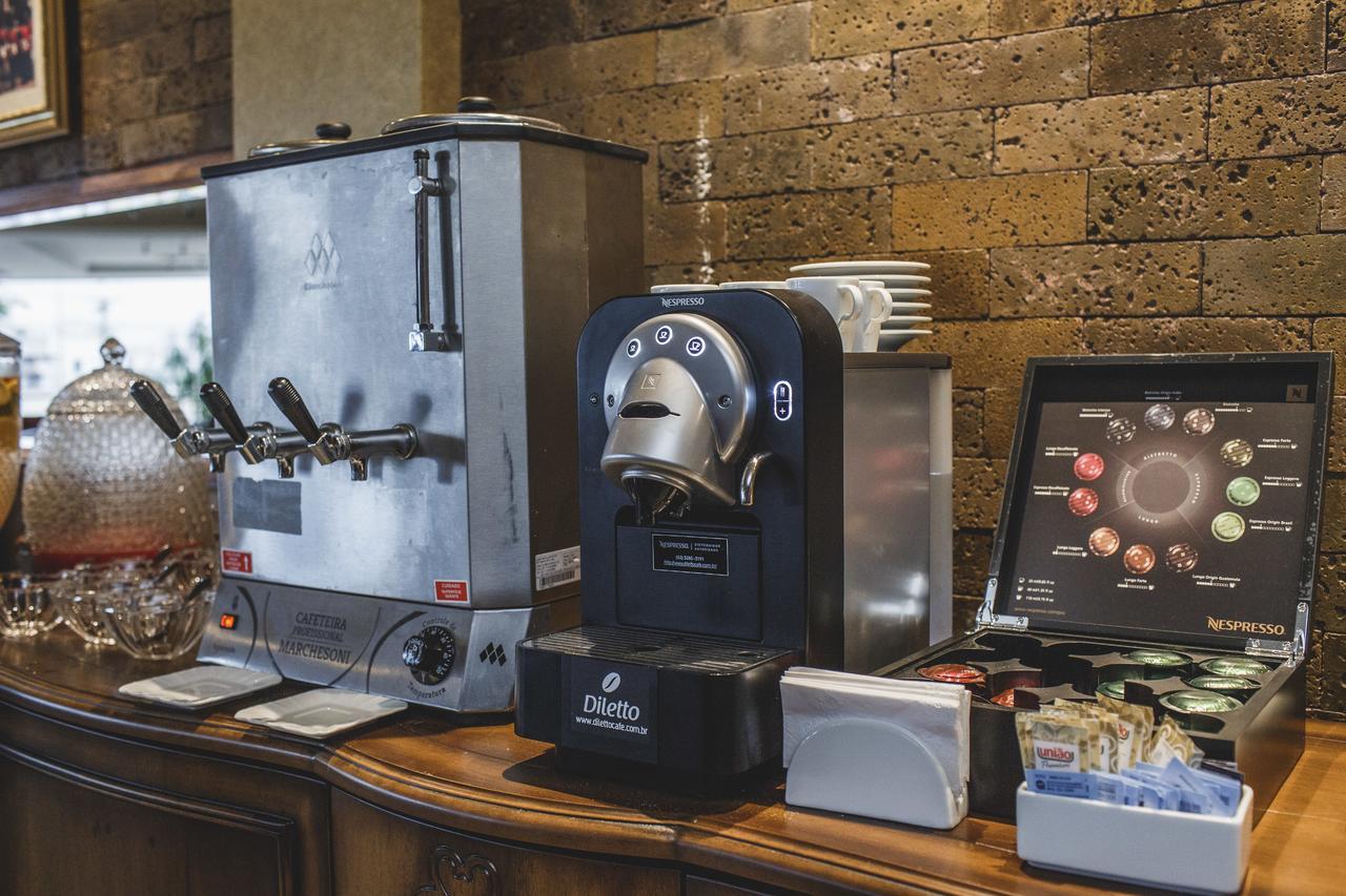 Golden Lis Hotel Boutique Goiânia Kültér fotó A single serve coffee machine